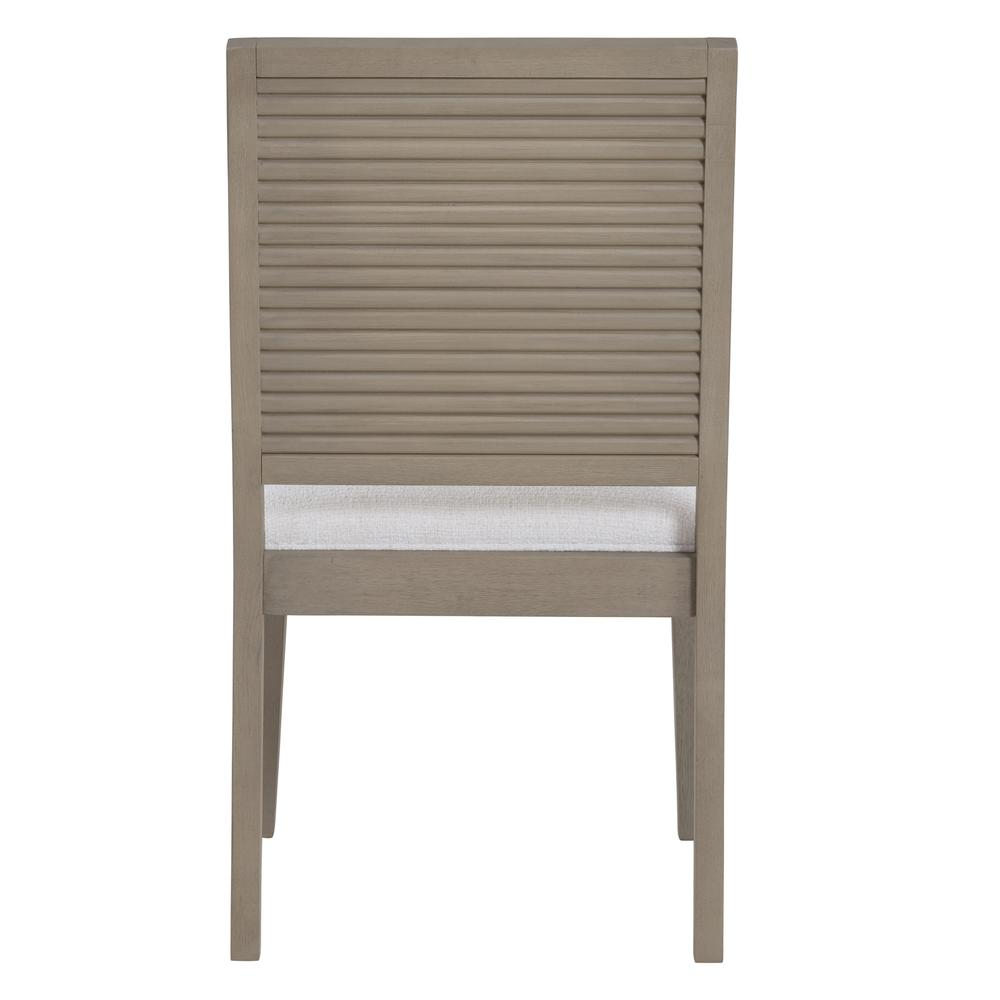 Lily Side Chair by Start2Finish, modern furniture with a sleek design, featuring a cushioned seat and wooden legs.