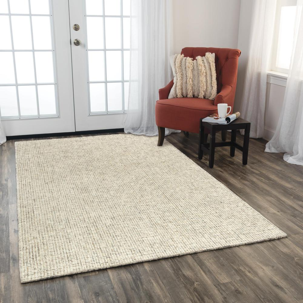 Hand tufted wool rug with loop pile, 5&