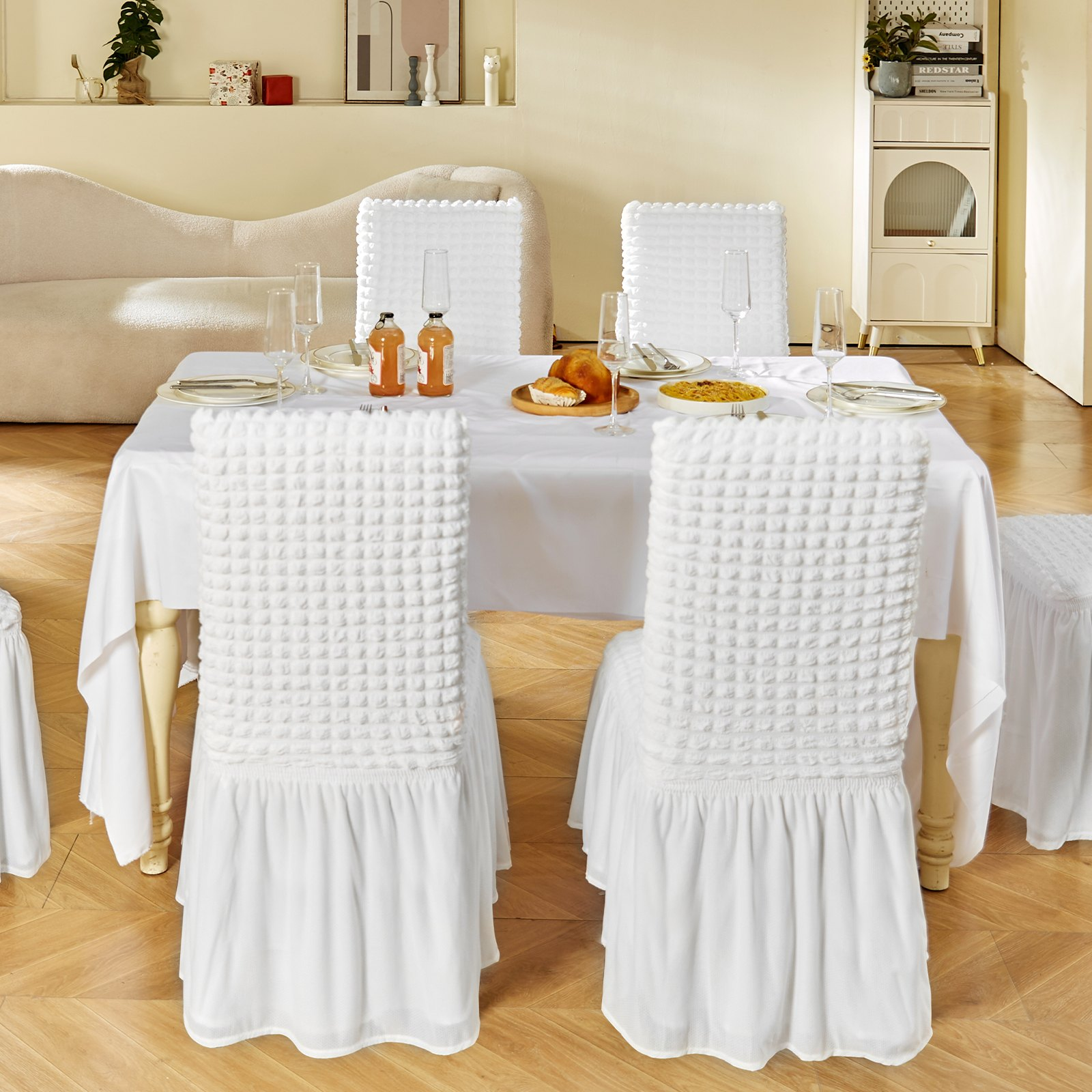 Set of four white VEVOR stretch spandex folding chair covers with skirts, fitted and washable for weddings, parties, and events.