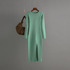 Carmine Juneberry long sleeve knitted backless round neck dress in autumn and winter, featuring a fitted silhouette and cozy fabric.