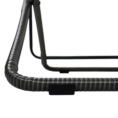 Black accent chair with yellow rattan armrests, modern furniture piece for living room by Start2Finish.