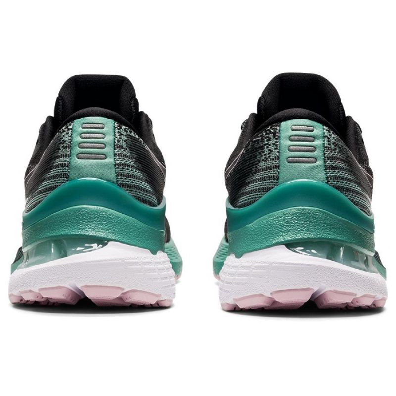 Asics Gel Kayano 28 W running shoes in gray and blue, featuring supportive design and cushioned soles for comfortable running.
