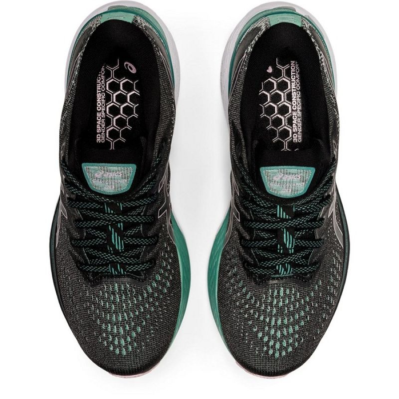 Asics Gel Kayano 28 W running shoes in gray and pink with cushioned soles and breathable mesh design.