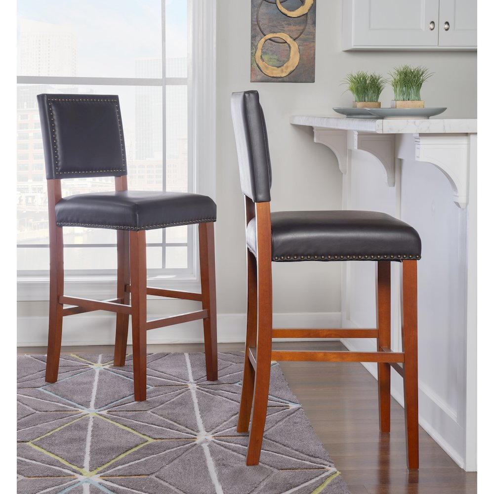 Black Brook Bar Stool by Start2Finish, featuring a sleek modern design and sturdy metal legs for contemporary kitchen or bar area.