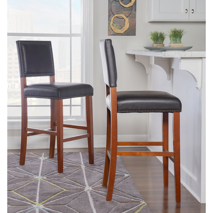 Black Brook Bar Stool by Start2Finish, featuring a sleek modern design and sturdy metal legs for contemporary kitchen or bar area.