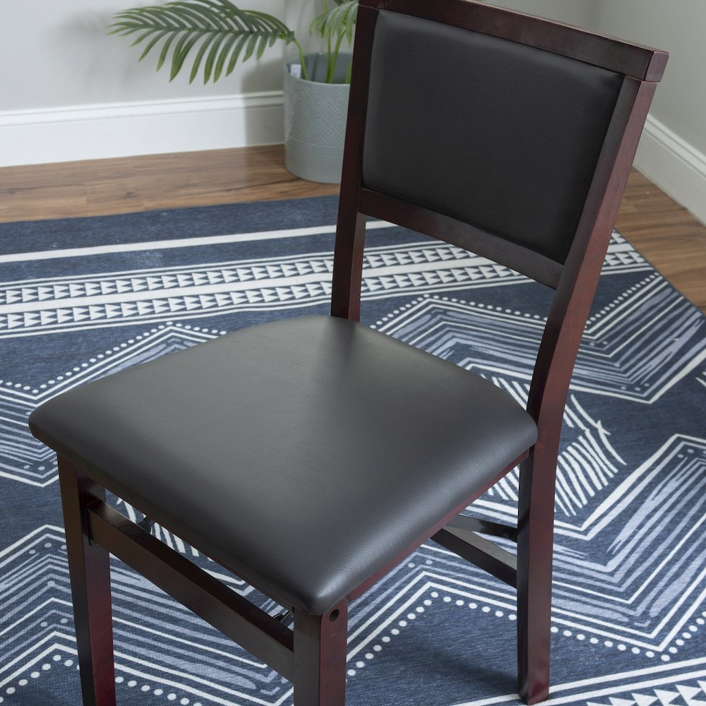 Set of two Kiera 18-inch pad back folding chairs by Start2Finish, showcasing sturdy metal frames and padded seats.