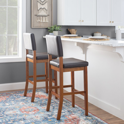 Brown Milano Bar Stool by Start2Finish featuring a sleek modern design with a cushioned seat and sturdy metal legs.