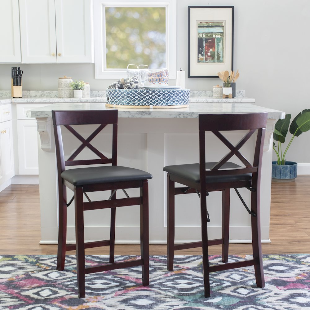Start2Finish Triena 24-inch back folding counter stool with wooden seat and metal frame, shown folded and upright.
