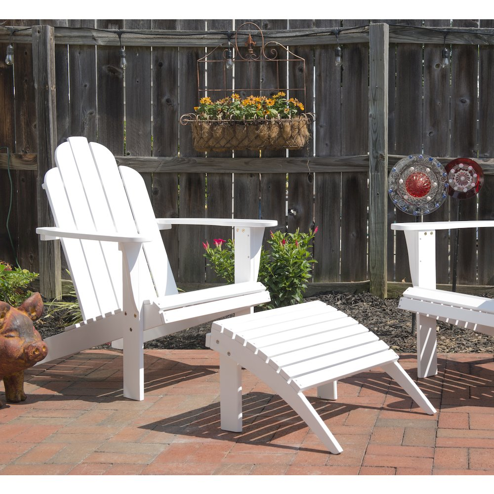 White Adirondack chair by Start2Finish, showing a comfortable wooden outdoor seating with wide armrests and slatted back design.