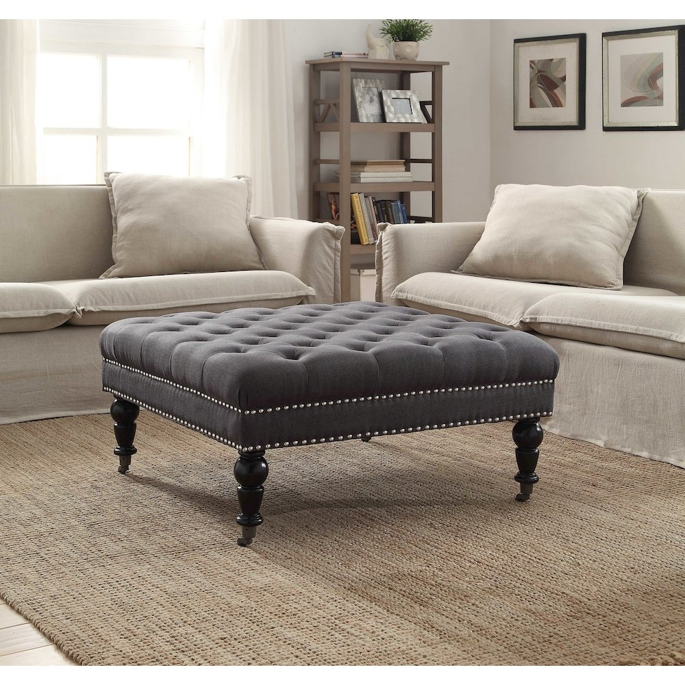 Charcoal square tufted ottoman from Start2Finish, featuring plush upholstery and modern furniture style.