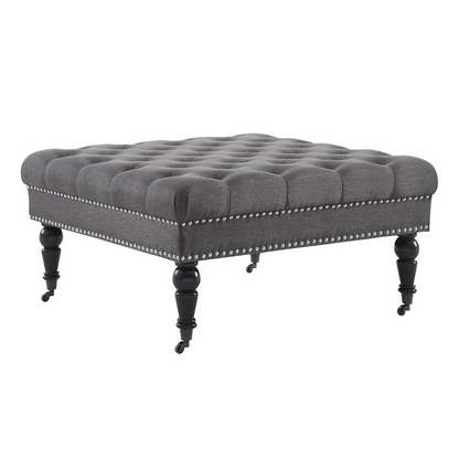 Charcoal square tufted ottoman from Start2Finish, featuring plush fabric and tufted detailing, used as versatile furniture.