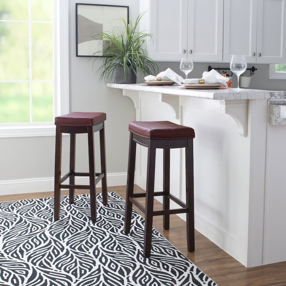 Start2Finish Claridge red barstool with a sleek upholstered seat and metal base, ideal for modern kitchen or bar areas.