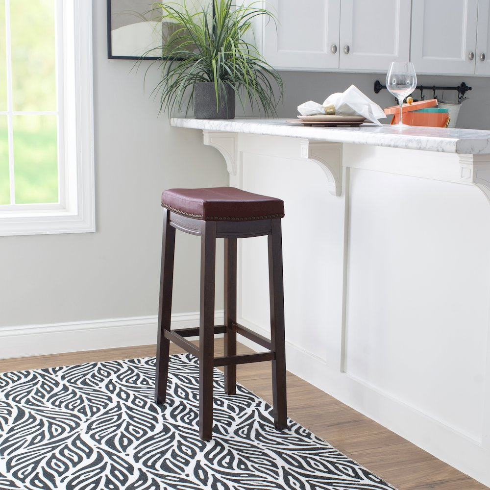 Start2Finish Claridge red barstool with a sleek design, featuring a padded seat and metal base, suitable for modern kitchens or bars.