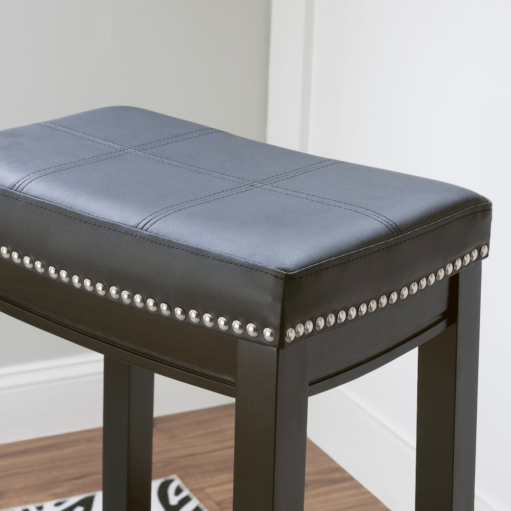 Claridge black barstool by Start2Finish with a sleek design, featuring a cushioned seat and sturdy metal frame.