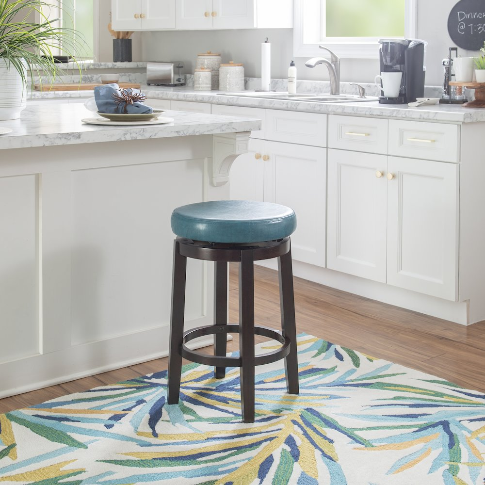 Start2Finish Maya Teal 24-inch counter stool with wooden legs and cushioned seat, ideal for kitchen or bar area.