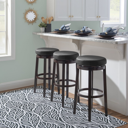 Maya Black 29-inch bar stool by Start2Finish with a modern design, featuring a sleek black seat and sturdy metal legs.