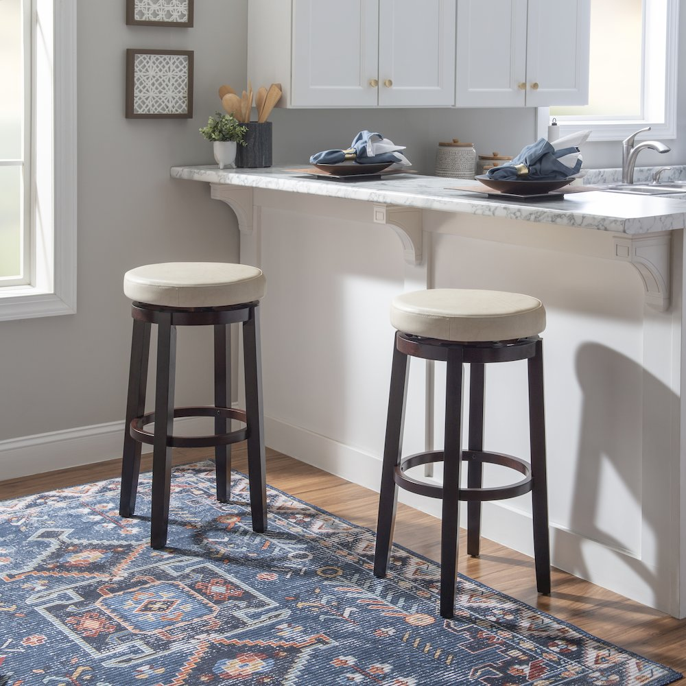 Start2Finish Maya Rice 29-inch bar stool with a sleek wooden seat and sturdy metal legs, shown from a side angle.