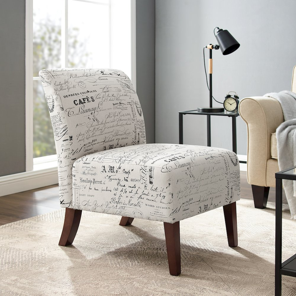 Linen Script Lily Chair by Start2Finish with a light linen fabric and elegant wooden legs, showcasing a stylish modern seat.