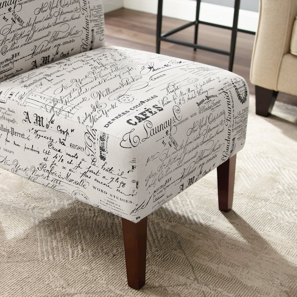 Linen Script Lily Chair by Start2Finish with a light-colored fabric and elegant wooden legs, modern and stylish seating.