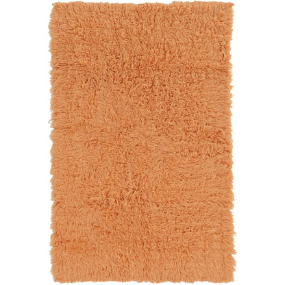 Start2Finish Flokati 1400g Sherbet 5x8 rug with soft, plush texture in vibrant sherbet color on a neutral floor.