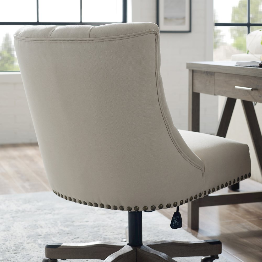 Della Natural Office Chair by Start2Finish featuring a cushioned seat, ergonomic design, and wooden armrests in a modern workspace setting.