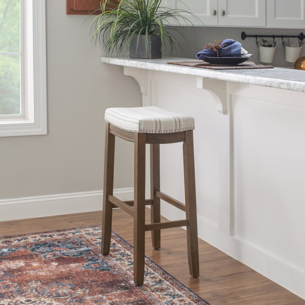 Claridge natural wood bar stool by Start2Finish featuring a sleek, modern design with a sturdy metal base and comfortable seat.