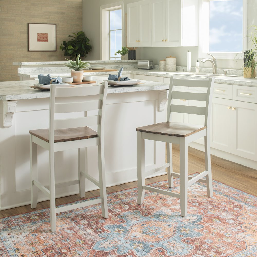 Start2Finish Colm Counter Stool with wooden legs and upholstered seat, shown in a modern kitchen setting.