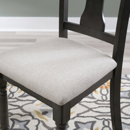 Willow Grey Side Chair by Start2Finish featuring a modern design with a grey upholstered seat and wooden legs.
