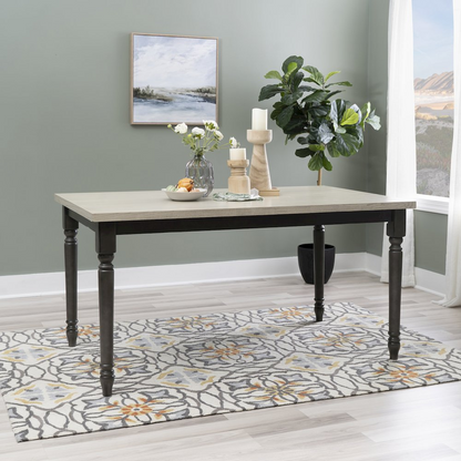 Willow Grey Dining Table by Start2Finish featuring a modern design with a smooth grey tabletop and sturdy wooden legs.