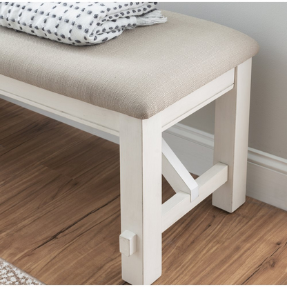 Distressed white wooden bench with a rustic finish, suitable for entryways or living rooms, by Start2Finish.