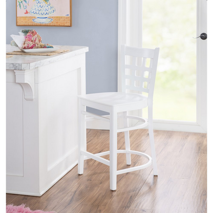 Pair of white Lola counter stools by Start2Finish, modern wooden seats with metal frames, shown in a stylish kitchen setting.