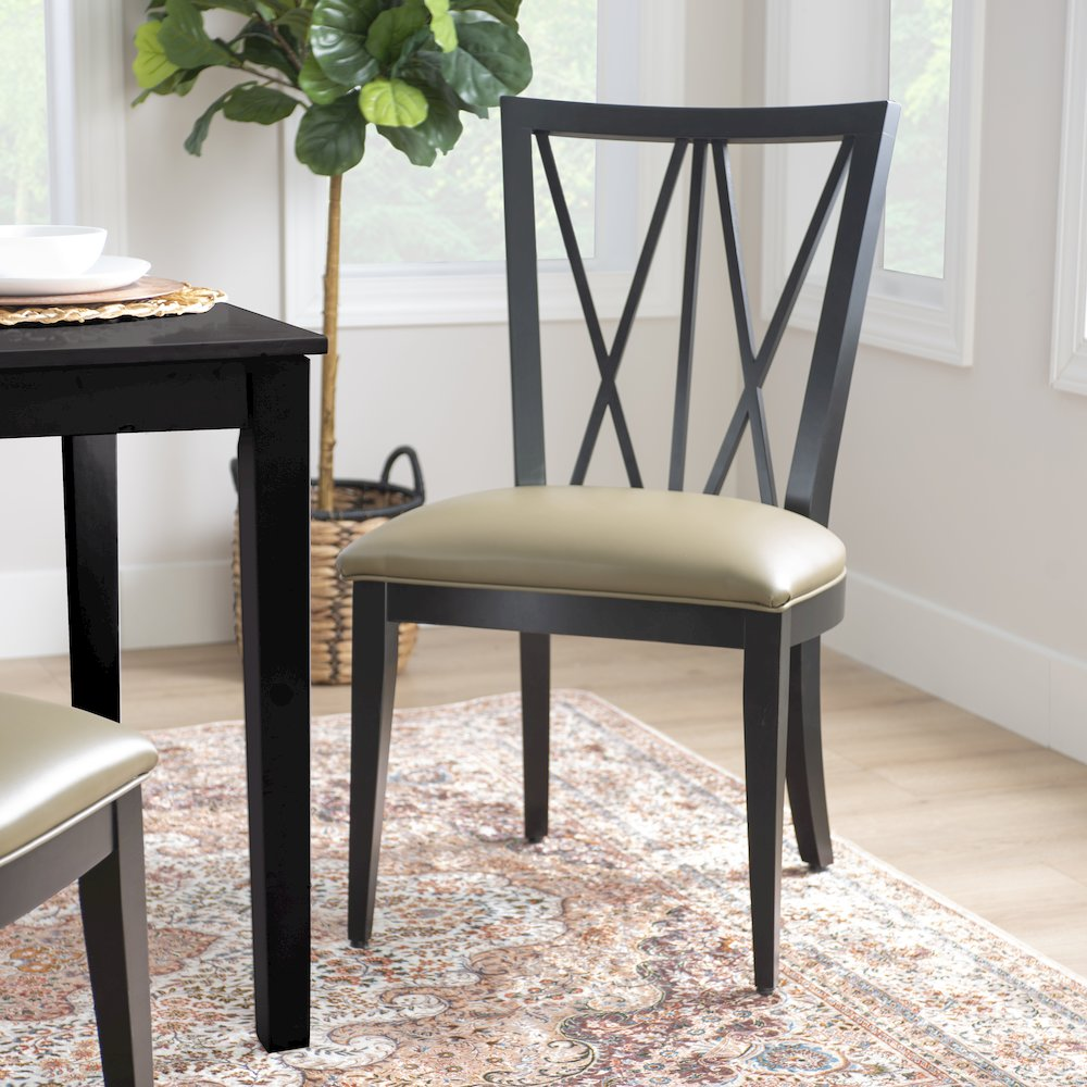 Black Bailey chair by Start2Finish featuring a modern design with a cushioned seat and stylish wooden legs.