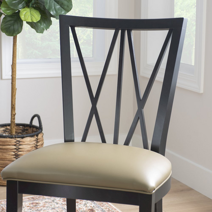 Black Bailey Chair by Start2Finish featuring a sleek, modern design with a cushioned seat and sturdy wooden legs.