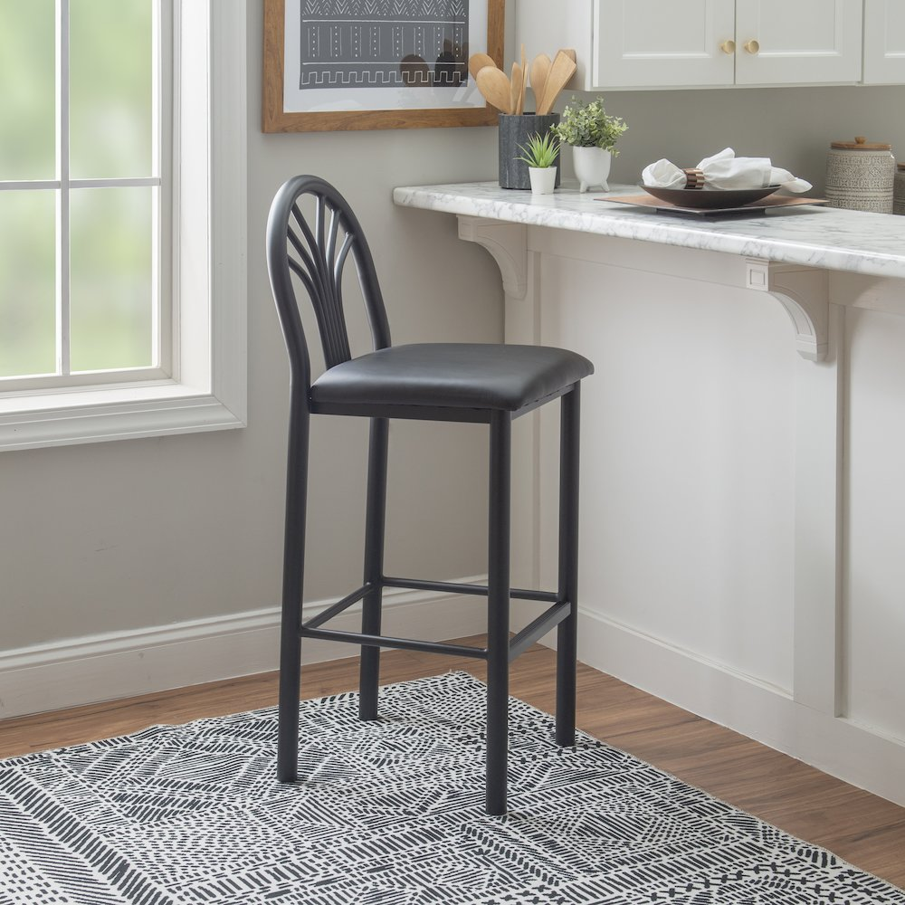 Two black Thayer barstools from Start2Finish with sleek modern design, featuring sturdy legs and cushioned seats.