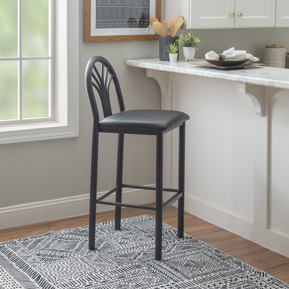 Two black Thayer barstools from Start2Finish with sleek modern design, featuring sturdy legs and cushioned seats.
