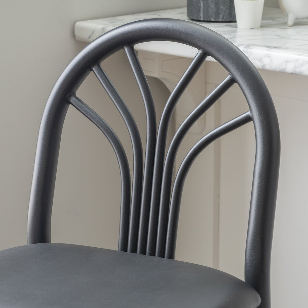 Two black Thayer barstools from Start2Finish with sleek, modern design, featuring round seats and sturdy metal legs.
