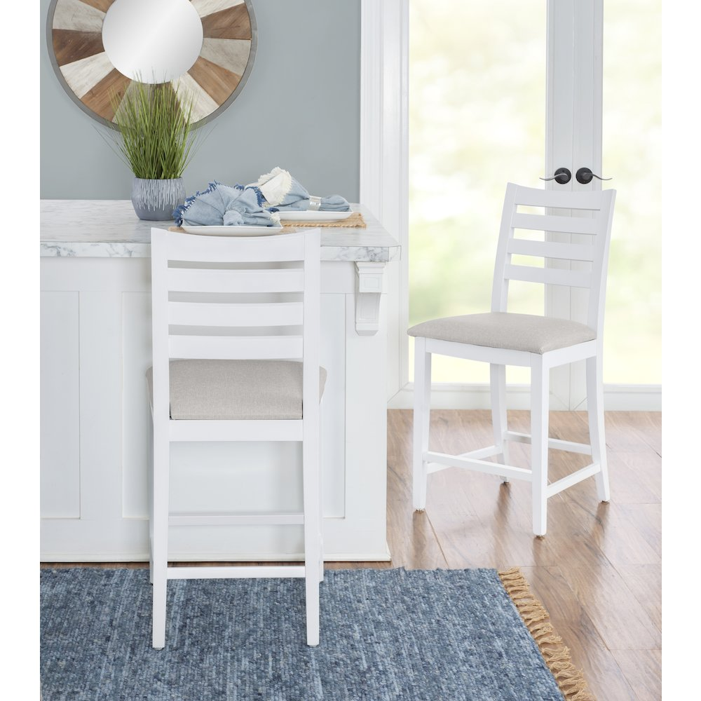 Set of two white upholstered Flynn counter stools by Start2Finish, featuring modern design and padded seats.