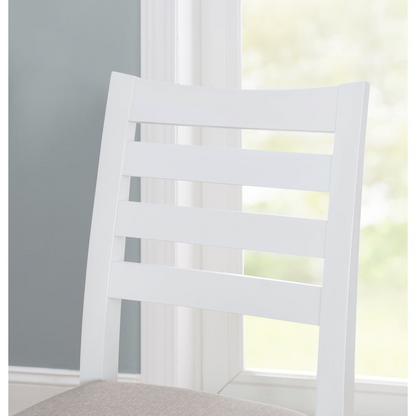 Set of two Flynn counter stools with white upholstered seats and dark wooden legs, modern design for kitchen or bar area.
