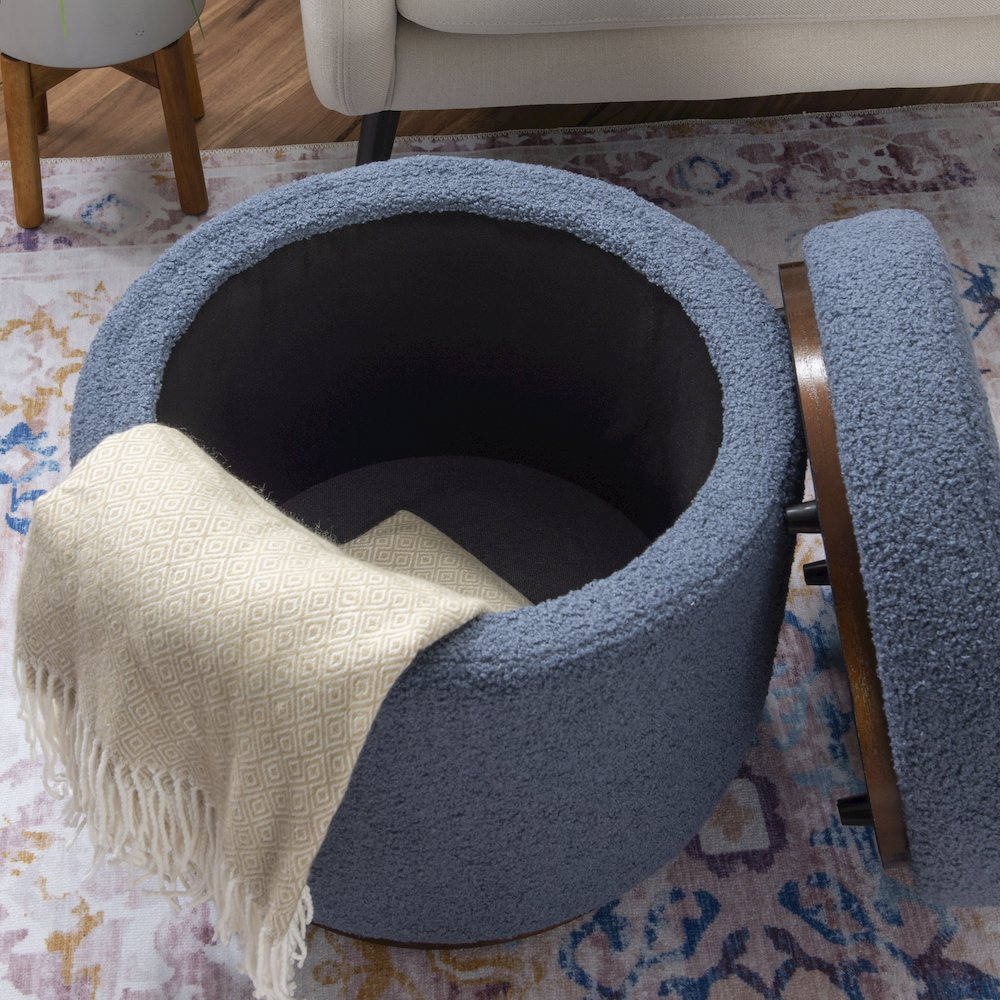Blue Gry Walnut Blanche Storage Ottoman by Start2Finish with a cushioned top and wooden legs, ideal for living room storage.