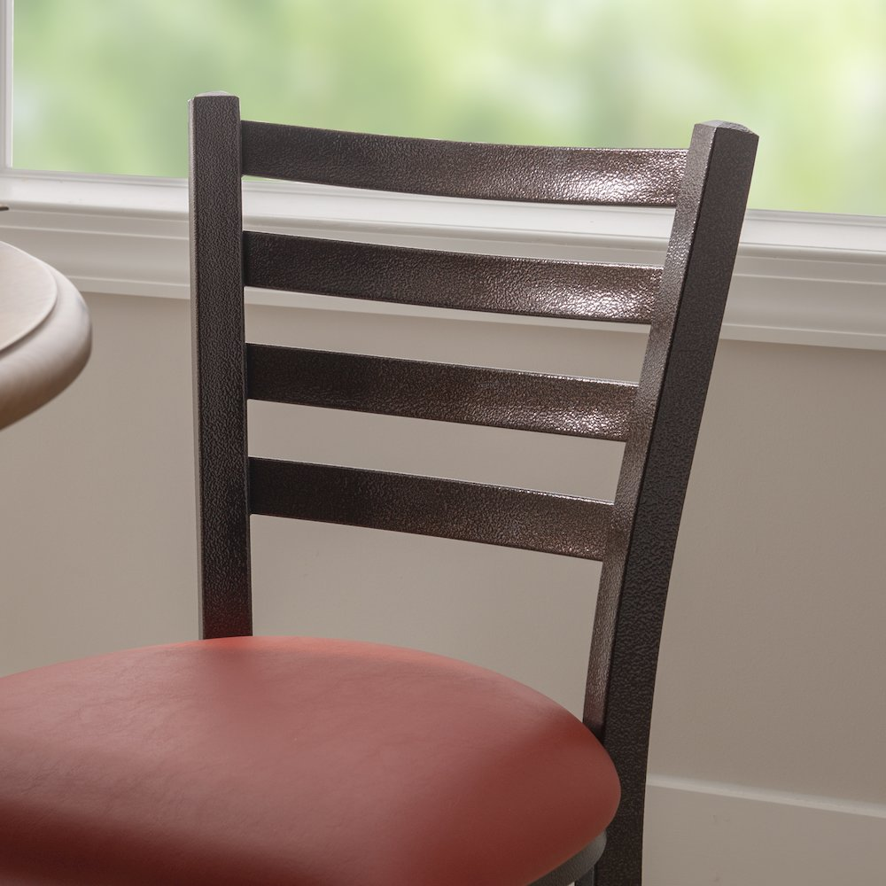 Set of two red Baxter metal side chairs by Start2Finish with sleek metal frames and modern design.