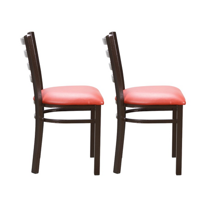 Set of two red Baxter metal side chairs by Start2Finish, featuring sturdy metal frames and modern design.
