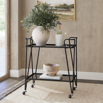 Black mid-century bar cart from Start2Finish with wheels and shelving, stylish furniture piece for drinks and entertaining.