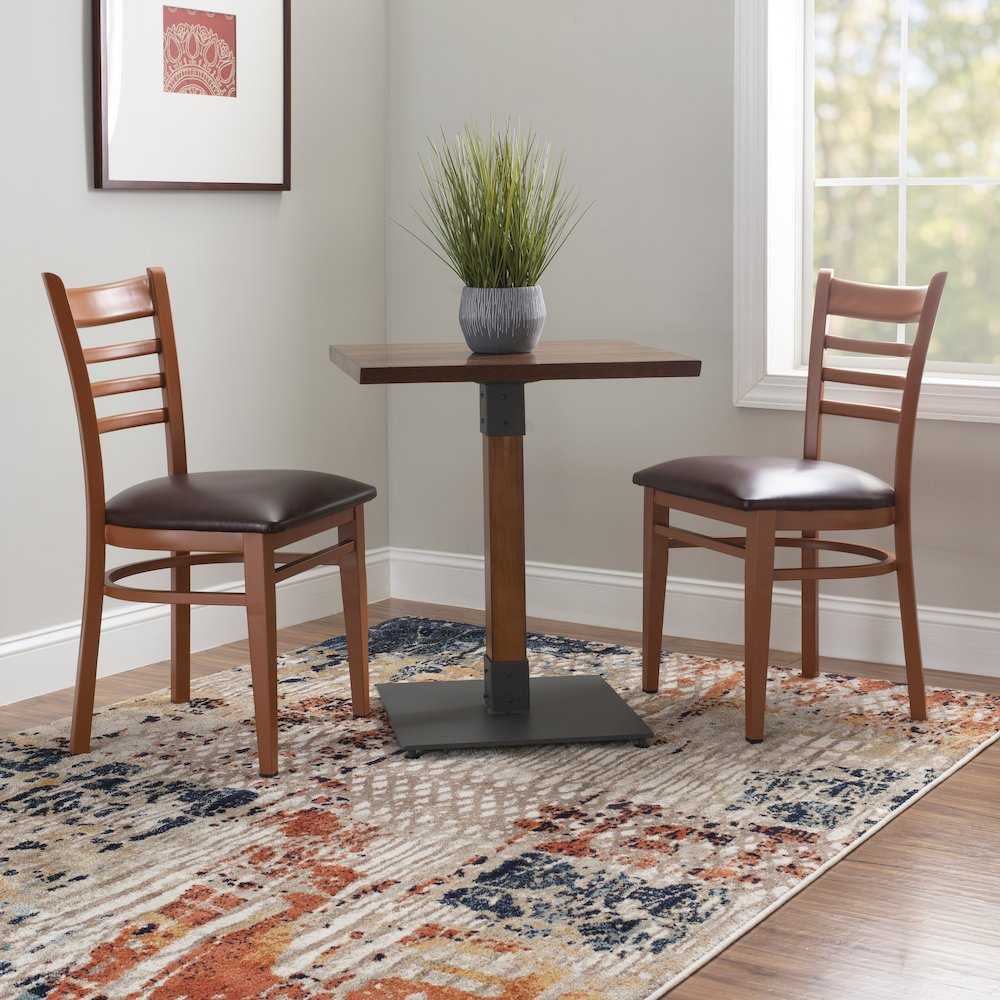 Set of two Start2Finish Baxter metal side chairs in honey and burgundy with sleek metal frames and cushioned seats.