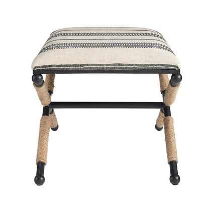 Start2Finish Logue Campaign Ottoman in soft fabric with wooden legs, showcasing a modern, versatile furniture piece.