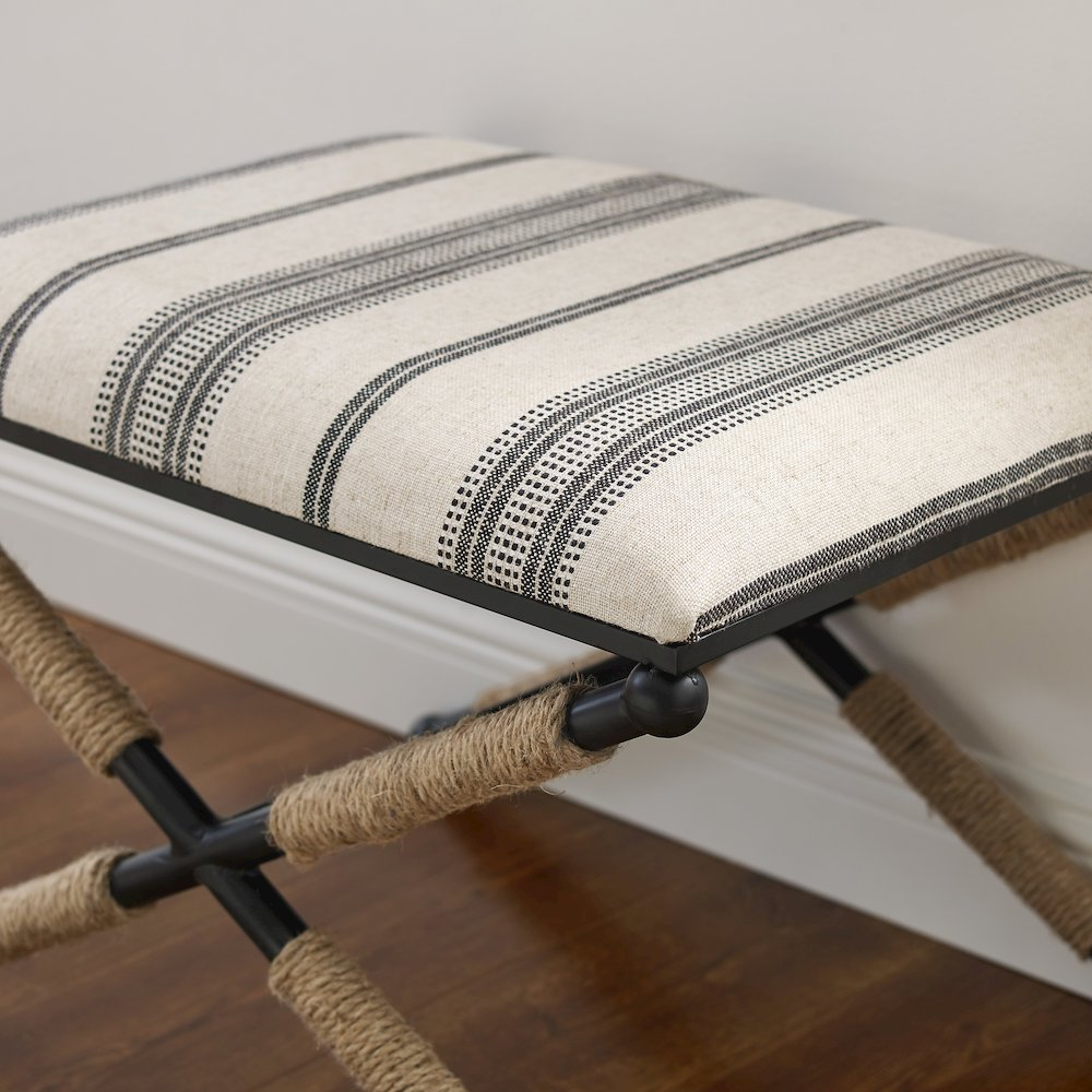 Start2Finish Logue Campaign Ottoman with wooden legs, upholstered in neutral fabric, versatile for living room or lounge area.