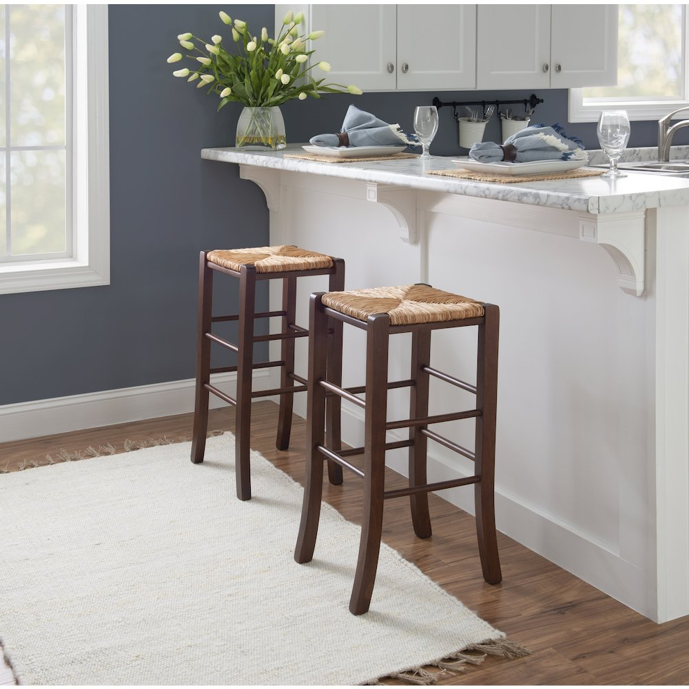 Set of two Gianna backless walnut barstools with sleek wooden seats and sturdy metal legs, modern furniture for home or bar area.