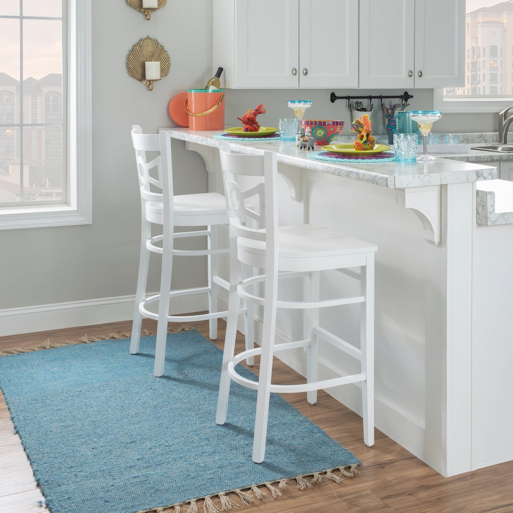 Set of two white Teresa barstools by Start2Finish, featuring sleek modern design and sturdy wooden legs for stylish seating.
