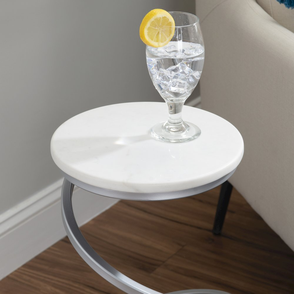 Silver and white marble spiral drink table by Start2Finish, showcasing a sleek modern design with a silver metal base.