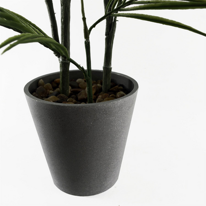 Artificial palm tree in a decorative planter, ideal for home or office decor, by Start2Finish.