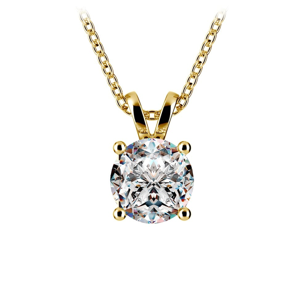 Round diamond pendant with prong setting in white and yellow gold, featuring G-VS clarity and 0.5/0.75 carats from Start2Finish